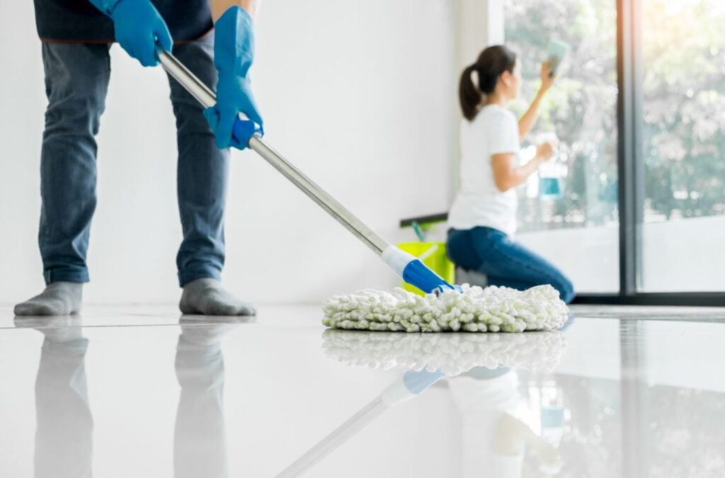 A professional from The Sunshine Cleaners performing deep cleaning in a New Tampa, FL home, ensuring a spotless environment.